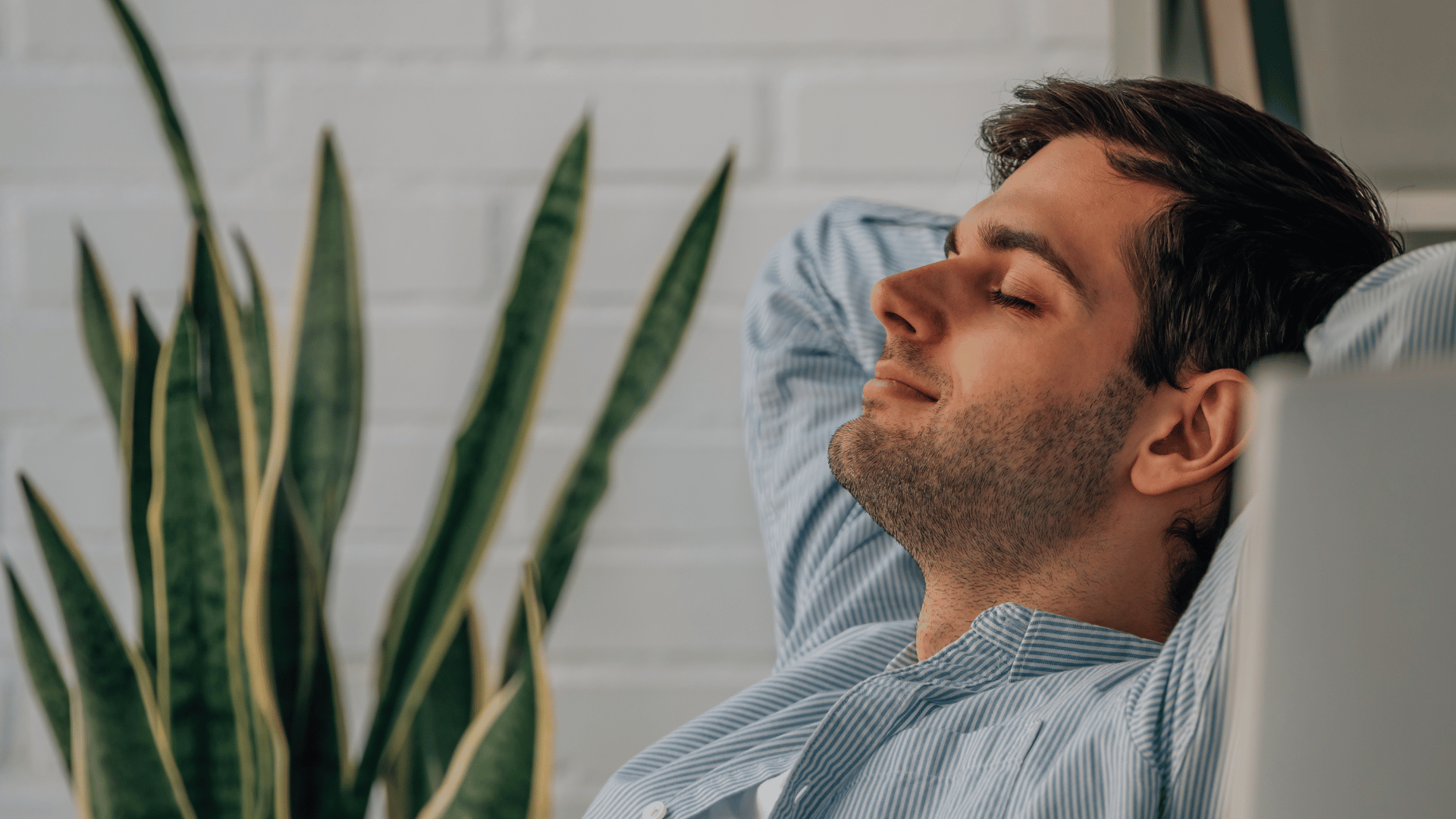 Smiling man representing confidence and vitality from using male enhancement supplements